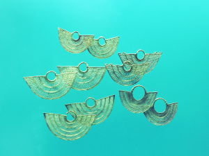 gold jewelry and sculpture